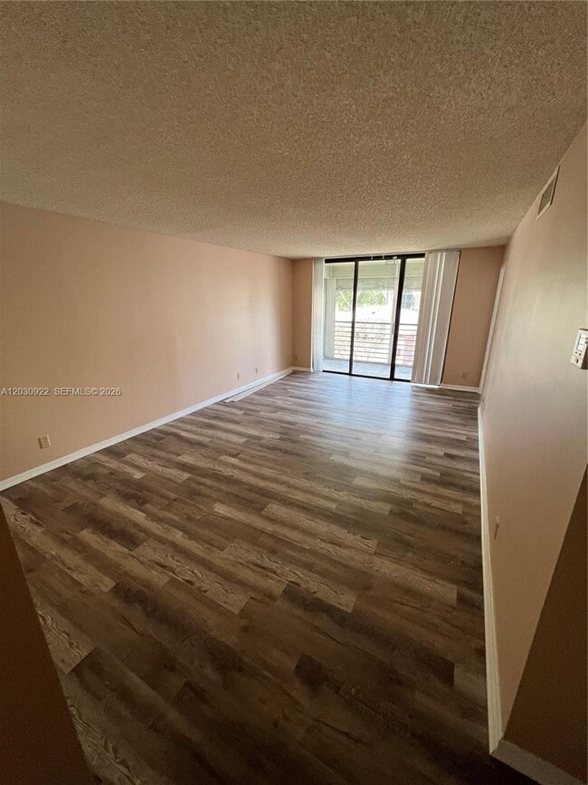 Building Photo - 7650 W McNab Rd Unit 204