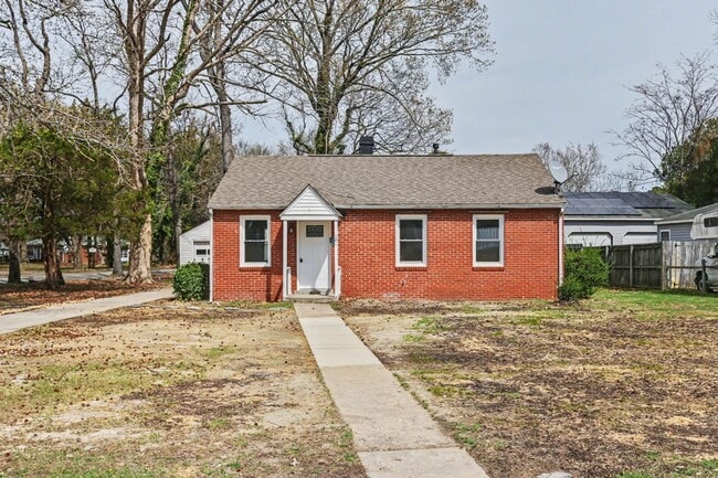 Photo - Renovated 3-Bedroom Home with Spacious Yard & Detached Garage