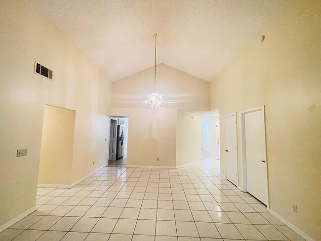 Photo - Beautiful 4 Bed / 2 Bath Single-Family Home with Fenced Yard & Screened Patio