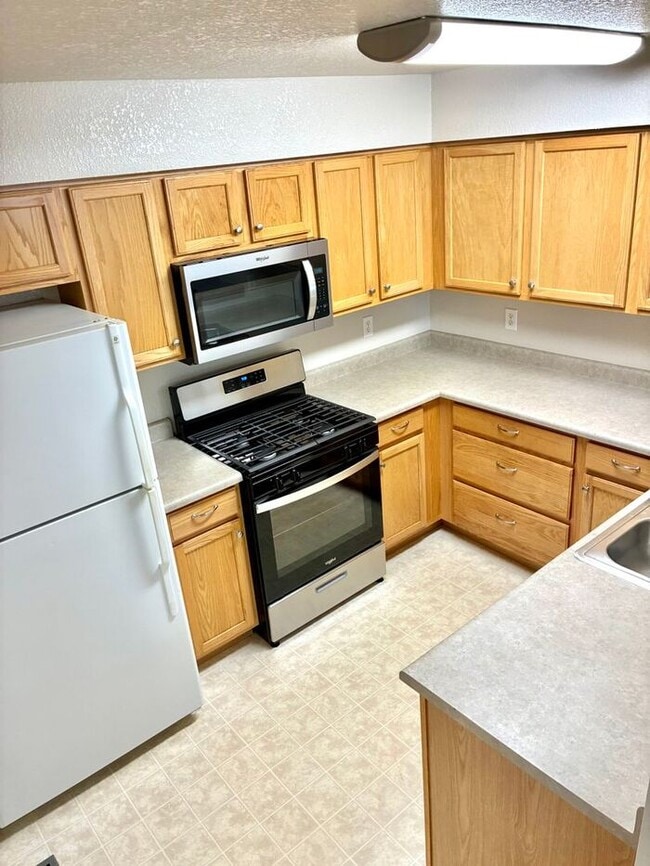 Photo - Beautiful and Spacious 3 Bed, 3.5 Bath Townhome in SE Fort Collins. Detached 1 Car Garage. Water/...
