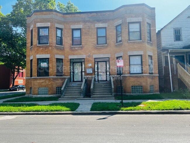 Building Photo - 6401 S Eberhart Ave Unit 6403 -1