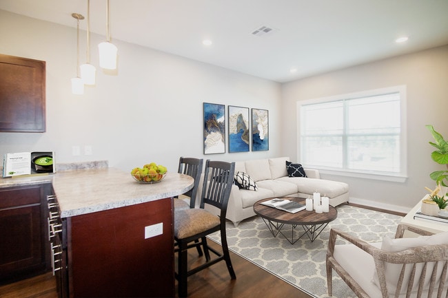 Sala de estar y cocina - Residence at Wolfforth