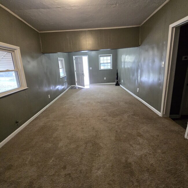 Photo - Great Craftsman style home with large private yard that's partially fenced.