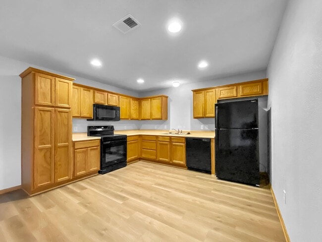 Photo - 3BR/2BA Home for Rent in Grain Valley, MO 64029 | Fenced Yard | Fireplace | Garage | Pet-Friendly