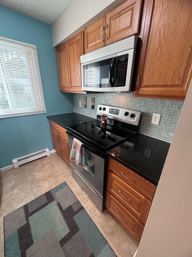 Photo - 3 BEDROOM CONDO WITH A 1 CAR GARAGE AND INCLUDES UTILITIES!