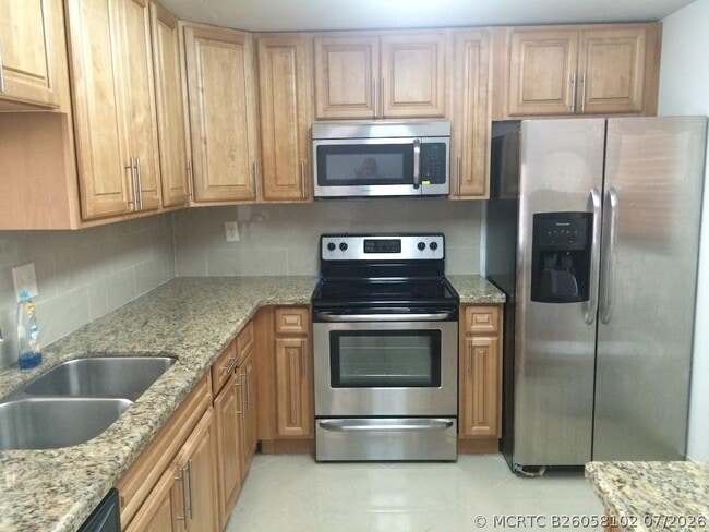 Building Photo - 485 N Pine Island Rd Unit 201A