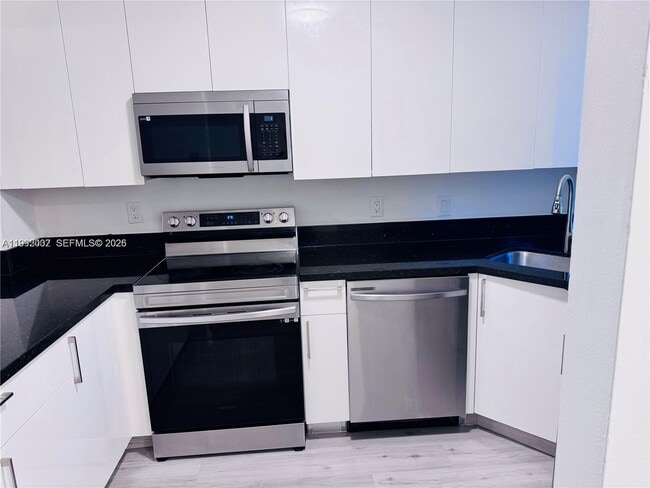 Photo - 2660 W 76th St Unit 207