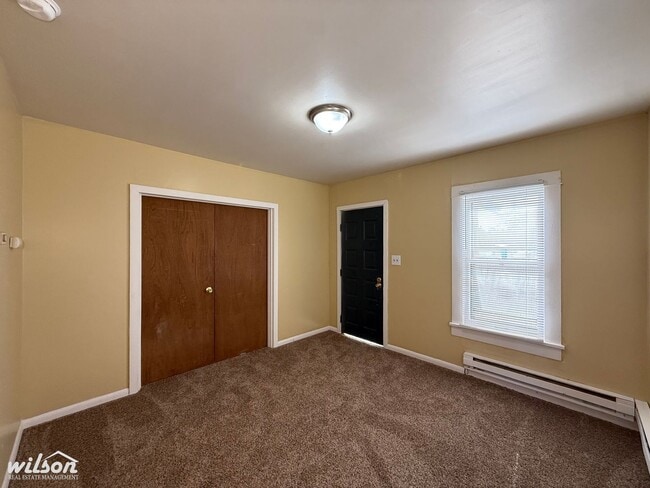 Building Photo - Cozy 2-Bedroom Home with Fenced Yard & Rear Parking!