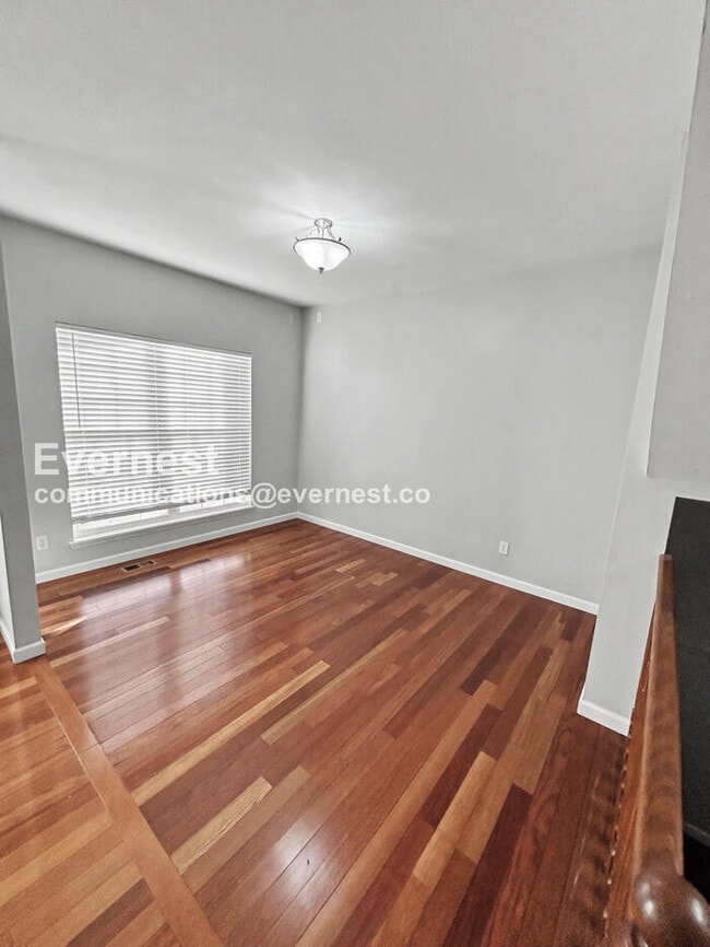 Photo - Spacious 4-Bed Home with 2-Car Garage & Modern Amenities