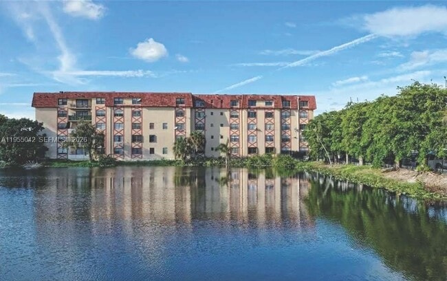 Building Photo - 1325 W 68th St Unit 113