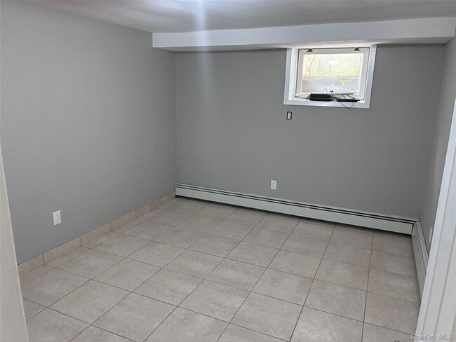 Photo - 56-25 136th St Unit 1FL