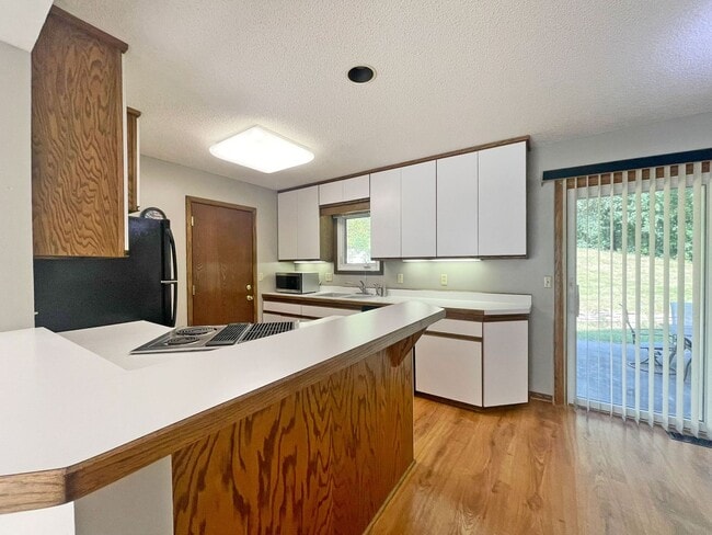 Photo - 4-Level Home with Fireplace & Big Yard is ...