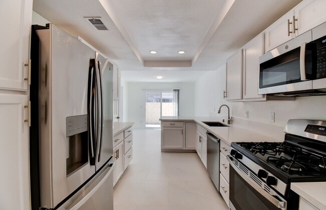 Photo - Beautifully renovated two-story home tucked inside a quiet, tree-lined community in the heart of ... Unit 105 GOOSEBERRY LANE
