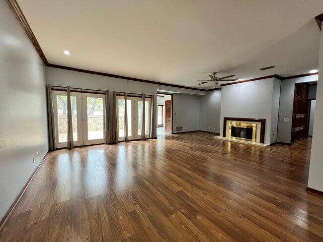 Fireplace from dining area - 8000 Donore Pl Unit 5