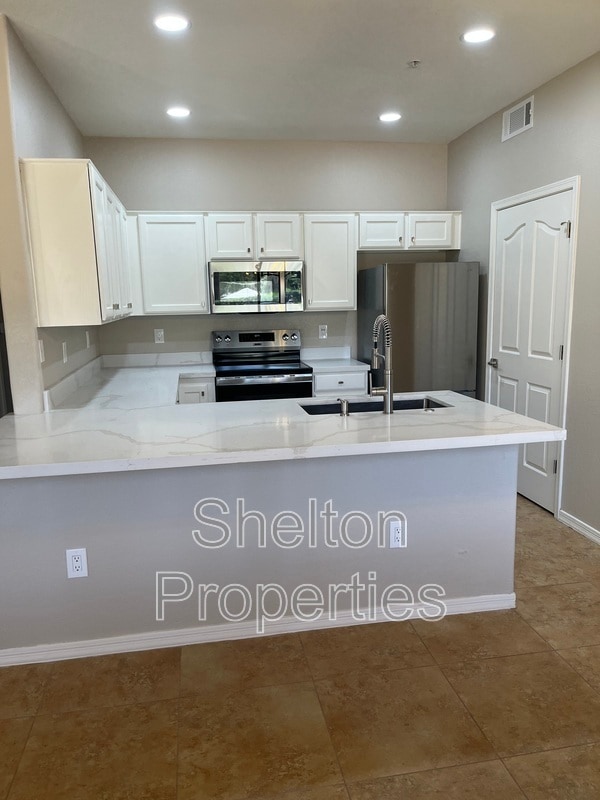 Photo - 6920 E 4th St Unit 103