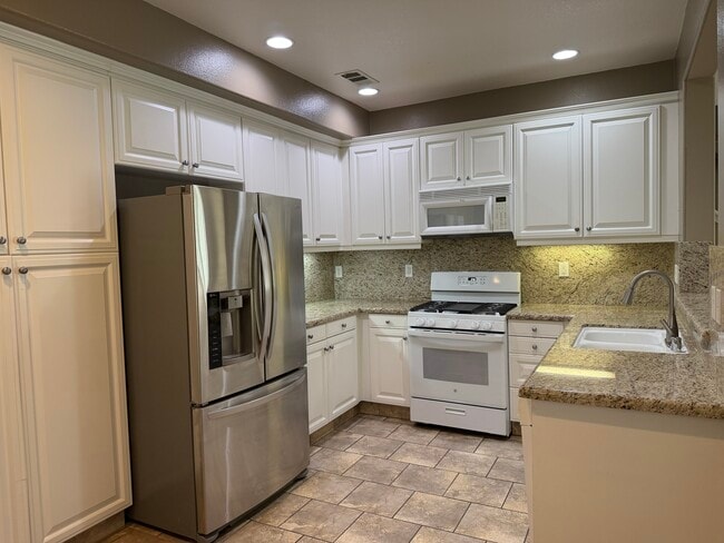 Kitchen with lots of cabinets - 28377 Mirabelle Ln