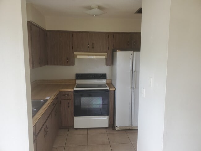 Kitchen from front door - 6538 W Norvell Bryant Hwy Unit 6538