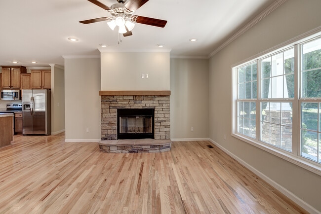 Living Room with Wood Burning Fireplace - 265 Lewis Creek Dr