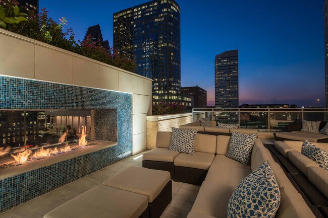 Elevated elegance — a starlit rooftop lounge with skyline views and city vibes. - Aris Market Square