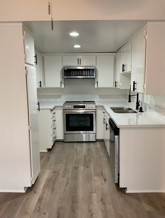2 bedroom kitchen - Sun Harbour Apartments