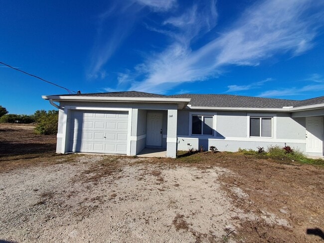 Building Photo - 1144-1146 Harry Ave S Unit 1146 Harry Ave S