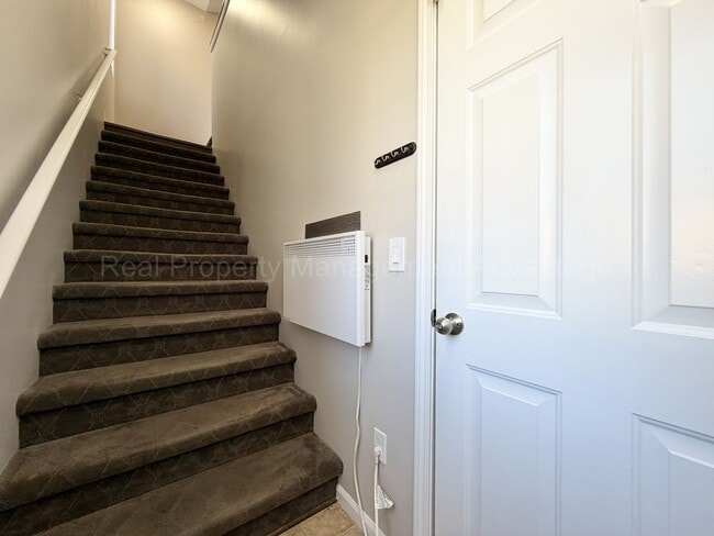 Photo - Rare Corner Upper Condo with Vaulted Ceilings, Private Balcony and 2 Car Garage - Right Across fr...