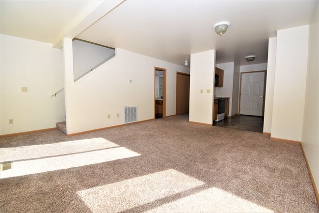 Photo - Townhouse style 2 bedroom 1.5 Bath with Attached Garage! Great Location! Unit C
