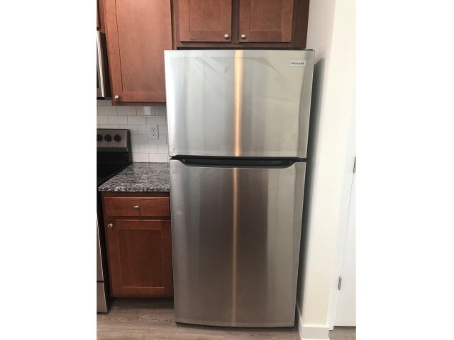 Full size refrigerators in every apartment.