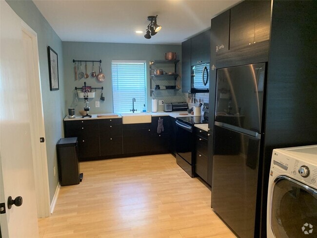 Building Photo - 6241 Wheaton Dr Rental