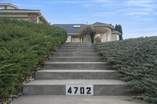 Photo - Executive 3 Bed Home with 3 Car Garage & Private Fenced Yard