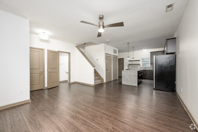 3BR, 2.5BA - 1,333SF - Living Room/Kitchen - The Win