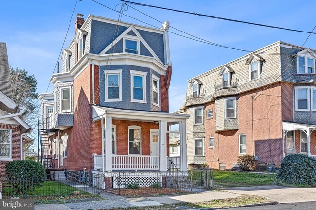 Building Photo - 102 W 30th St Unit 1 Rental