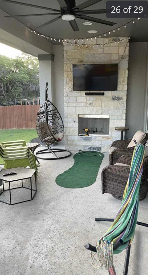 Back patio with real wood burning fireplace (gas line, too) - 24719 Resort Pky House