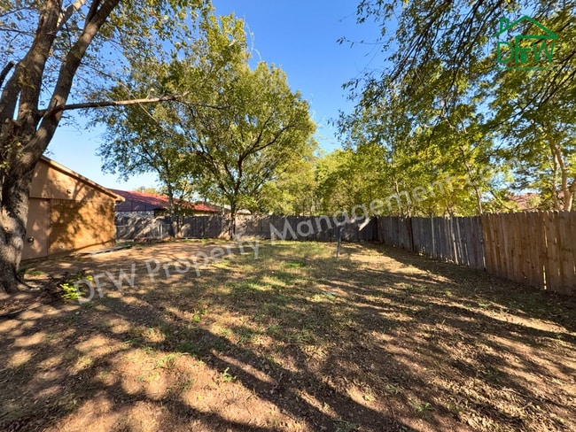 Photo - Cozy 3-Bedroom Home with Fireplace, Covered Patio & Large Fenced Backyard for Lease