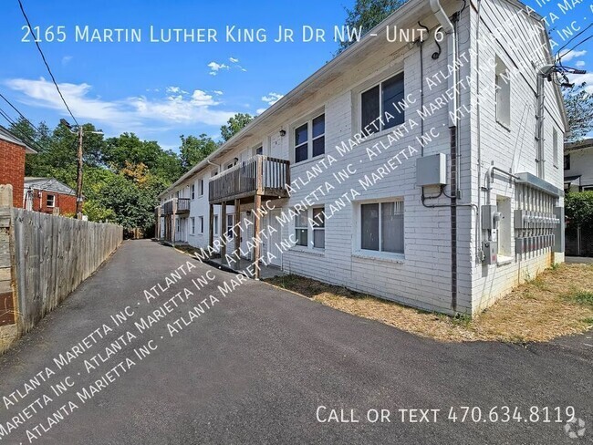 Building Photo - 1 Month Free Rent! Renovated 2/1 Condos Of... Unit 6