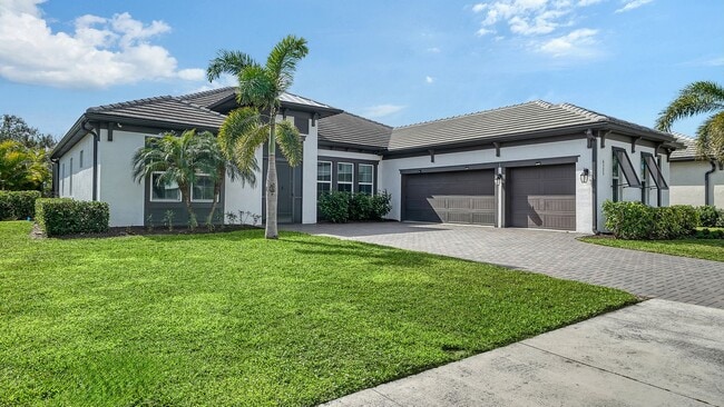 Building Photo - Furnished 4-Bedroom Home with Pool in The Sought After Neighborhood Of Rivo Lakes!!