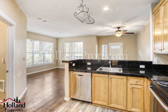 Photo - Elegant One-Bedroom Condo with Natural Light & Prime Location