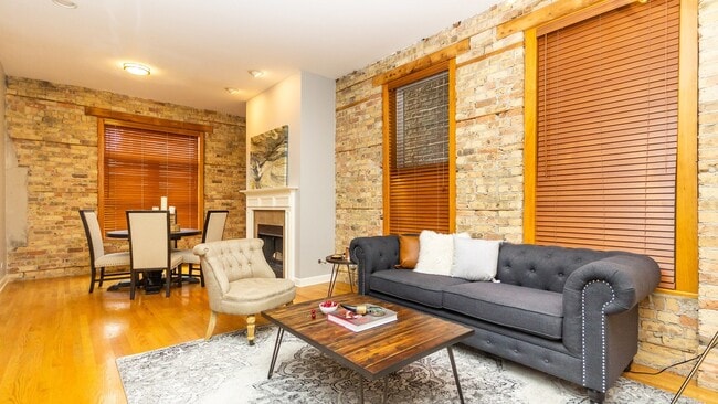 Cathedral ceilings, exposed brick - 743 N Wolcott Ave Unit #1