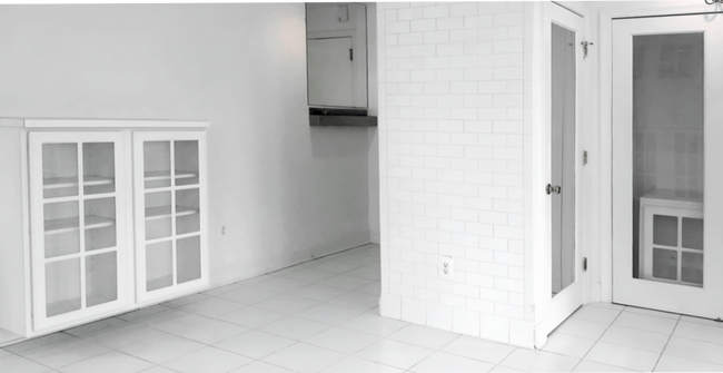 Building Photo - 1001 St Paul St Unit 12B