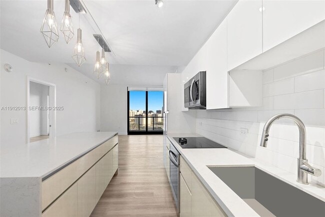 Photo - 101 Diplomat Pkwy Unidad 1204