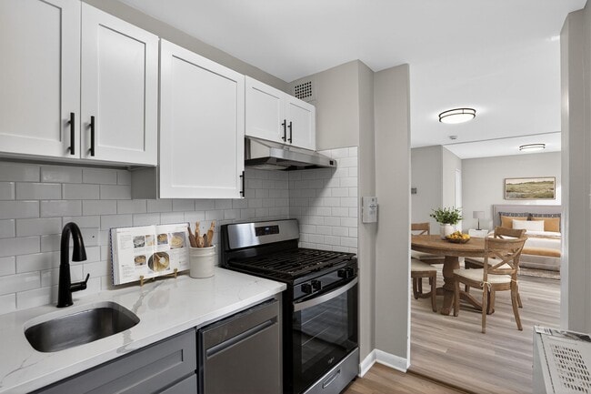 Welcome to Merrill House Apartments, where modern kitchens meet stylish living spaces. Enjoy the sleek design and functional features, perfect for your lifestyle. Elevate your home experience today—schedule a tour and find your new space!