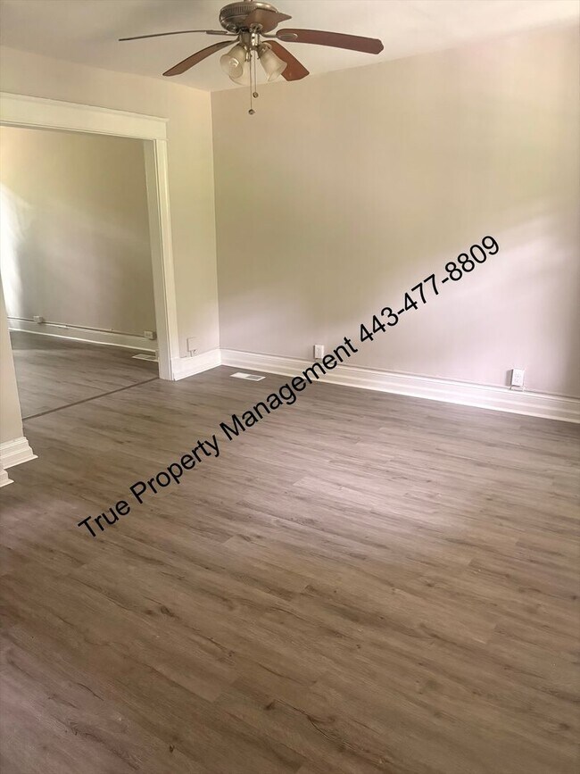 Photo - Spacious 3 Bedroom Home with Backyard & In-Unit Washer/Dryer