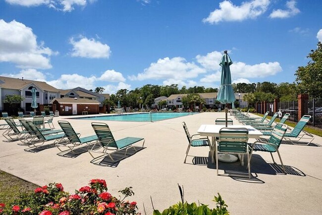 Photo - Furnished! Breezewood ground floor unit, Open floor plan, fire place, patio, large closets, wood ... Unit Apt 101