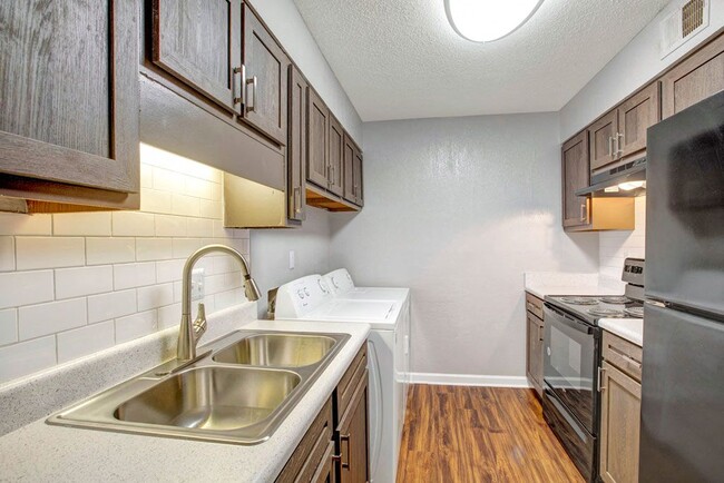 Kitchen - Pinewood at National Hills Apartments