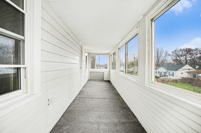 Photo - Updated 3BR Upper Unit with Garage Parking and Porch