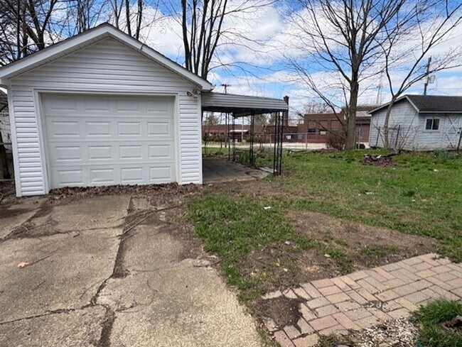 Photo - Cozy 2-Bed Single-Family in East Akron — Pet-Friendly, Garage + Covered Patio