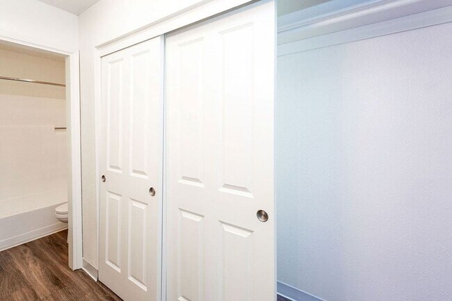 Main Bedroom Closet with Panel Doors and Ensuite