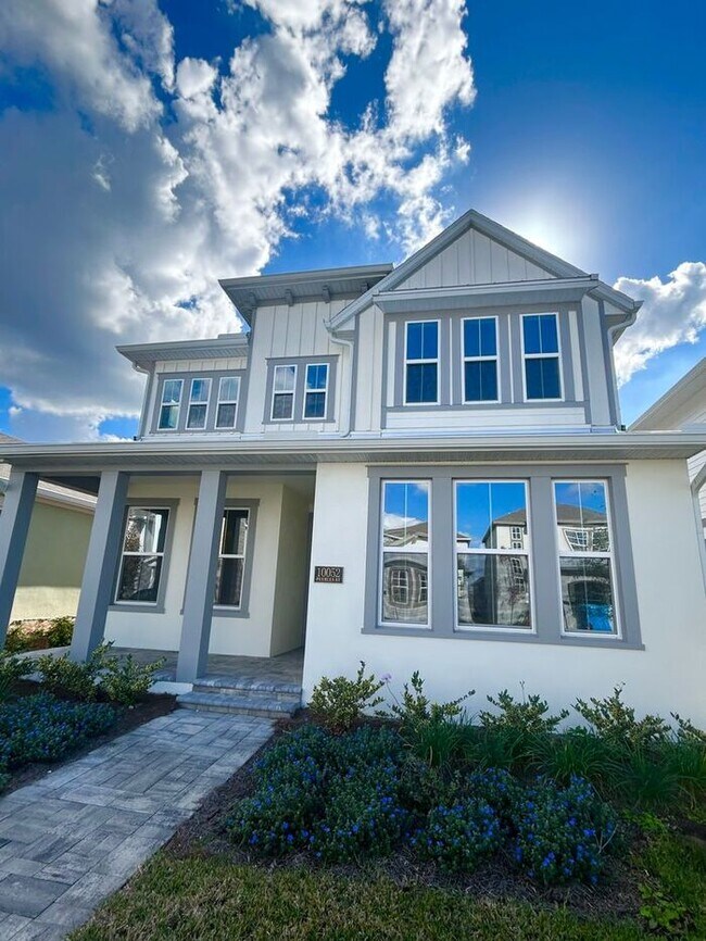 Photo - Gorgeous 4/3 Residence with a Private Back Lanai and a 3 Car Garage in the Delightful Laureate Pa...