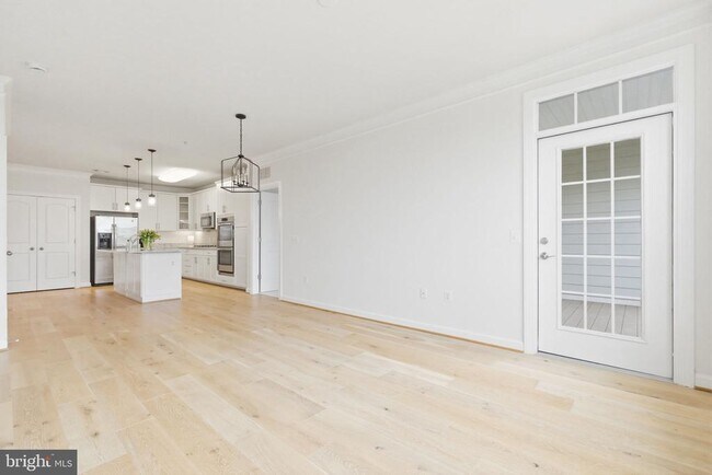 Building Photo - 13724 Neil Armstrong Ave Unit 505