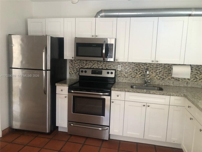 Photo - 1100 SW 10th St Unidad 1